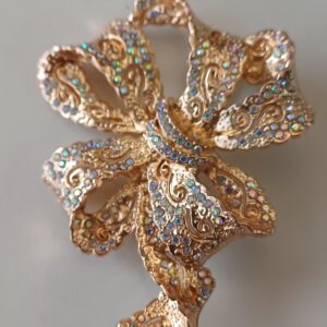 Spilla fiocco oro e strass