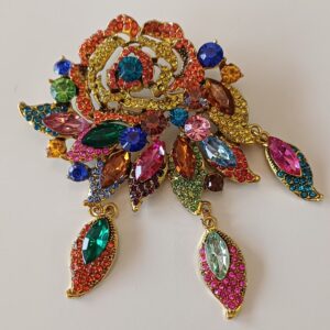SPILLA GRANDE CON STRASS COLORATI E CIONDOLI