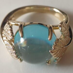 Anello lavorato con foglie e pietraccentrale sintetica acquamarina